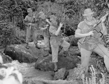 British Army patrol crossing a stream during the Mau Mau rebellion. IWM/Wiki Commons.