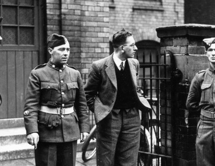 conscientious objector Sidney Spencer on his way to plead his case  at Liverpool tribunal,  25 March 1941. 