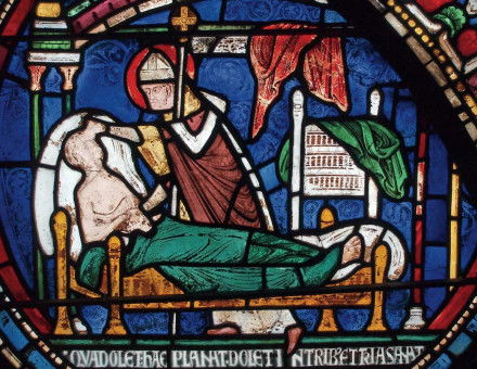 Saint Thomas Becket curing a man in his sickbed, stained glass window (detail), Canterbury Cathedral, early 13th century.