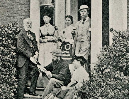 Charles Dickens with family and friends on the porch of Gad’s Hill. Georgina Hogarth is on the bottom right, c.1865.