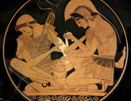 Achilles tending Patroclus wounded by an arrow, identified by inscriptions on the upper part of the vase. 