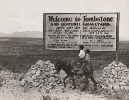 Sign entering Tombstone, Arizona mentioning the so-called Gunfight at the O.K. Corral, 1937.