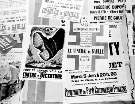 Paris plastered with posters in support of Charles de Gaulle. US National Archives. Public Domain. 