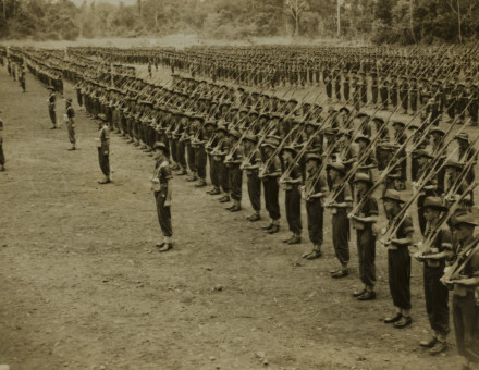 Military parade of Australian soldiers in New Guinea, c.  1943-1944. State Library of Queensland. Public Domain.
