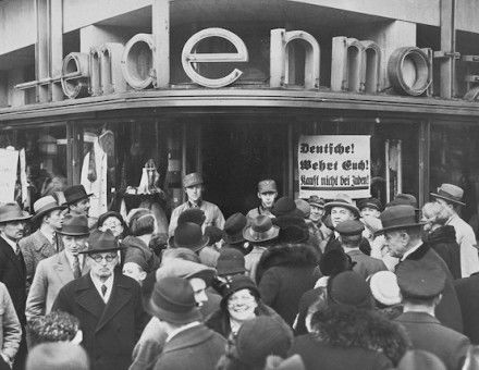 A crowd of Germans outside of a Jewish-owned department store in Berlin on the first day of the Nazi boycott of Jewish-owned businesses, 1 April 1933. United States Holocaust Memorial Museum, courtesy of National Archives. Public Domain.