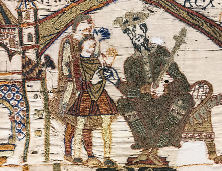 Edward the Confessor, enthroned, in the opening scene of the Bayeux Tapestry. Wikimedia Commons