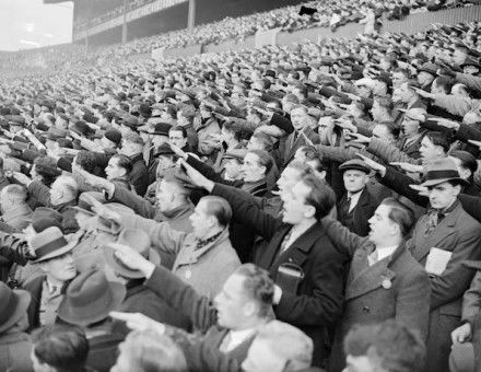 German football supporters giving the Nazi salute, White Hart Lane, London, 1935. Mirrorpix/Alamy Stock Photo.