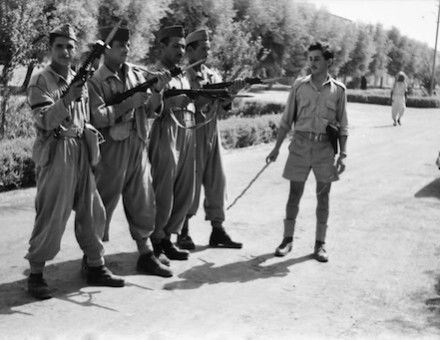A group of Iraqi soldiers on the street, 1958. Museum of African Art (Belgrade). Public Domain.