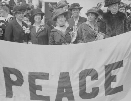 US delegates, including Jane Addams (second from left, front), travel to the International Congress of Women, 1915. Library of Congress. Public Domain.