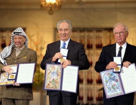 PLO Chairman Yasser Arafat, Israeli foreign minister Shimon Peres, and Israeli prime minister Yitzhak Rabin receive the Nobel Peace Prize, Saar Yaacov, 1994. Government Press Office (CC SA 3.0).