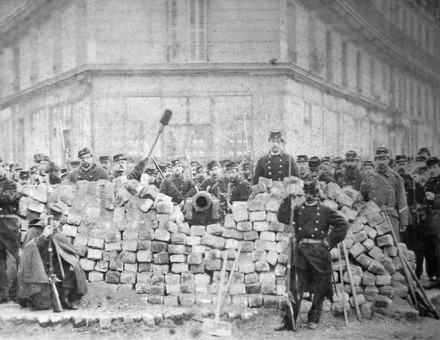  A barricade on Rue Voltaire, after its capture by the regular army during the Bloody Week