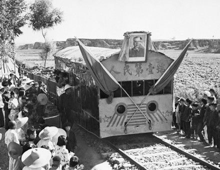 Blood on the tracks: a portrait of Mao adorns a freight train in Yuhsien County, Shansi Province, May 5th, 1958.