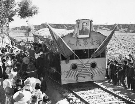 Blood on the tracks: a portrait of Mao adorns a freight train in Yuhsien County, Shansi Province, May 5th, 1958.