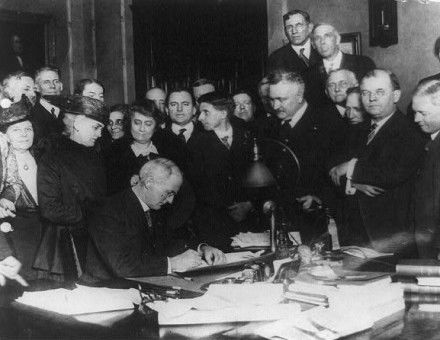  Governor James P. Goodrich signs the Indiana prohibition act, 1917.