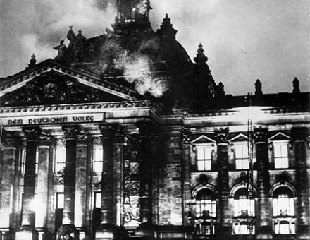 Firemen work on the burning Reichstag.