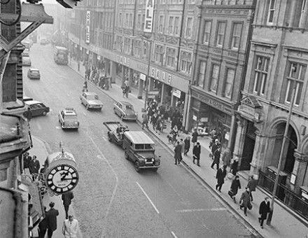 Once a rare sight, a CCTV camera overlooks a street in Croydon, 1968. William Lovelace / Getty Images.