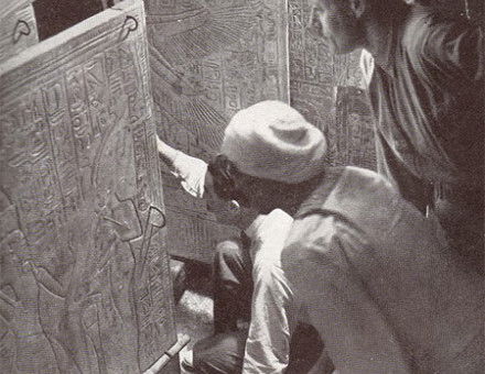 Howard Carter and associates opening the shrine doors in the burial chamber (1924 reconstruction of the 1923 event)