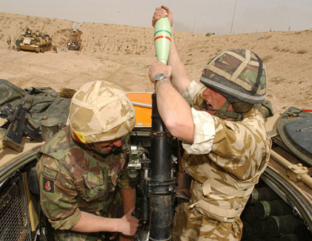 British soldiers engage Iraqi Army positions south of Basra, 26 March 2003.