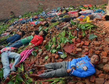 Children re-enact the death of intellectuals during the Liberation War, Dhaka, December 14th, 2013