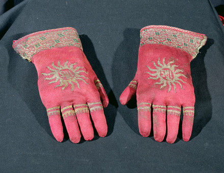 Glad hands: a pair of late 15th-century knitted silk and gold-thread gloves.