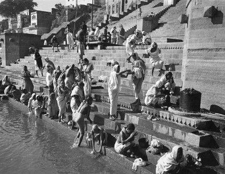 Hindu pilgrims wash in the Ganges, c.1940