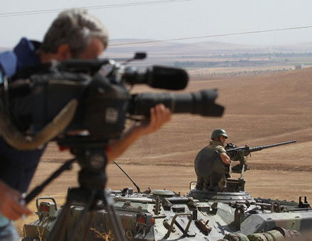 Recorded history: a cameraman follows troop movements in Northern Iraq, 2014.