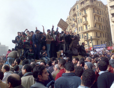 Demonstrators on Army Truck in Tahrir Square, Cairo by Ramy Raoof.  Licensed under CC BY 2.0 via Wikimedia Commons.