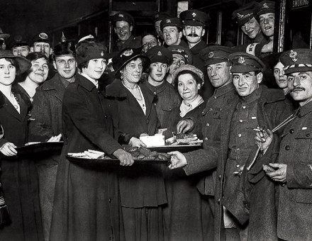 Equal rewards: returning soldiers are welcomed at a railway station, 1917.