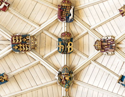 Big boss: the arms of Henry, Prince of Wales and Catherine of Aragon flank the initials of Henricus Rex (Henry VII).