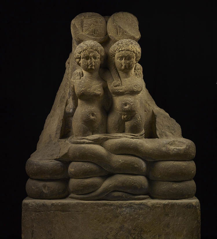 Egyptian limestone statue identified as Cleopatra and Mark Antony's twins Cleopatra Selene and Alexander Helios.