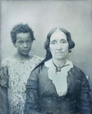 Daguerreotype of a New Orleans woman with her slave in the mid 19th century