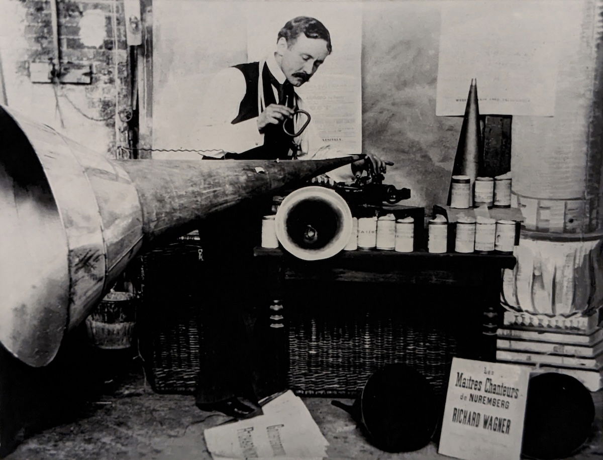 Lionel Mapleson recordin with his Edison Home Phonograph at the Metropolitan Opera House, c. 1901-3. New York Public Library. Public Domain.